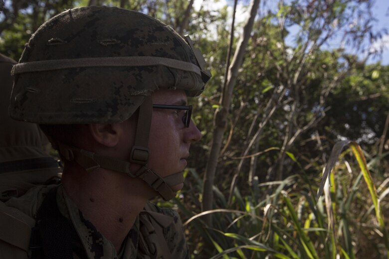 Pvt. Trevor Black provides security during a Tactical Recovery of Aircraft and Personnel training event in Exercise Bougainville II at Landing Zone Boondocker, Marine Corps Base Hawaii, on Oct. 26, 2017. Pvt. Black is a mortarman with 2nd Battalion, 3rd Marine Regiment, and a native of Springhill, Fla. Exercise Bougainville II prepares 2nd Bn., 3rd Marines for service as a forward deployed force in the Pacific by training them to fight as a ground combat element in a Marine Air-Ground Task Force. (U.S. Marine Corps photo by Lance Cpl. Isabelo Tabanguil)