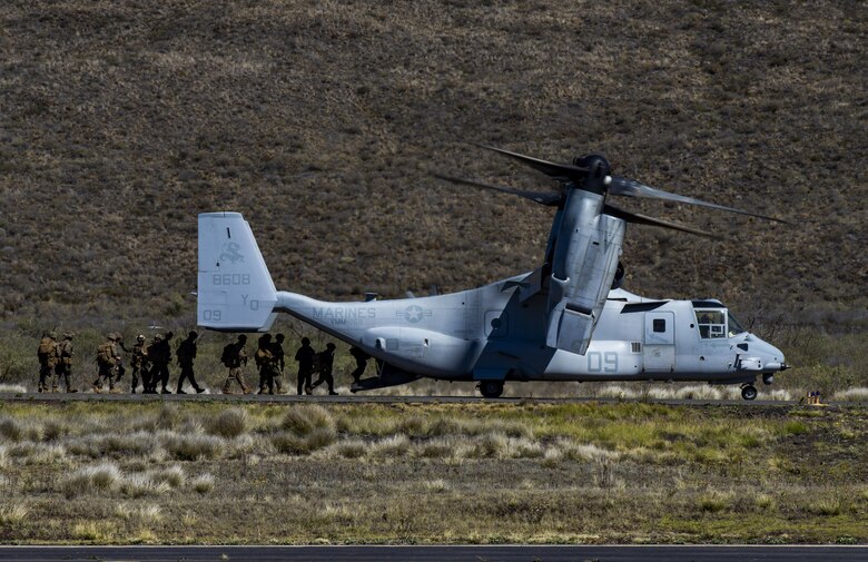 U.S. Marines with 2nd Battalion, 3rd Marine Regiment get in an MV-22 Osprey at the Pohakuloa Training Area, on the island of Hawaii, Oct. 26, 2017. Marine Medium Tiltrotor Squadron 268 supported 2nd Battalion, 3rd Marine Regiment in a Tactical Recovery of Aircraft and Personnel mission during Exercise Bougainville II. Exercise Bougainville II prepares 2nd Bn., 3rd Marines for service as a forward deployed force in the Pacific by training them to fight as a ground combat element in a Marine Air-Ground Task Force. (U.S. Marine Corps photo by Sgt. Ricky Gomez)