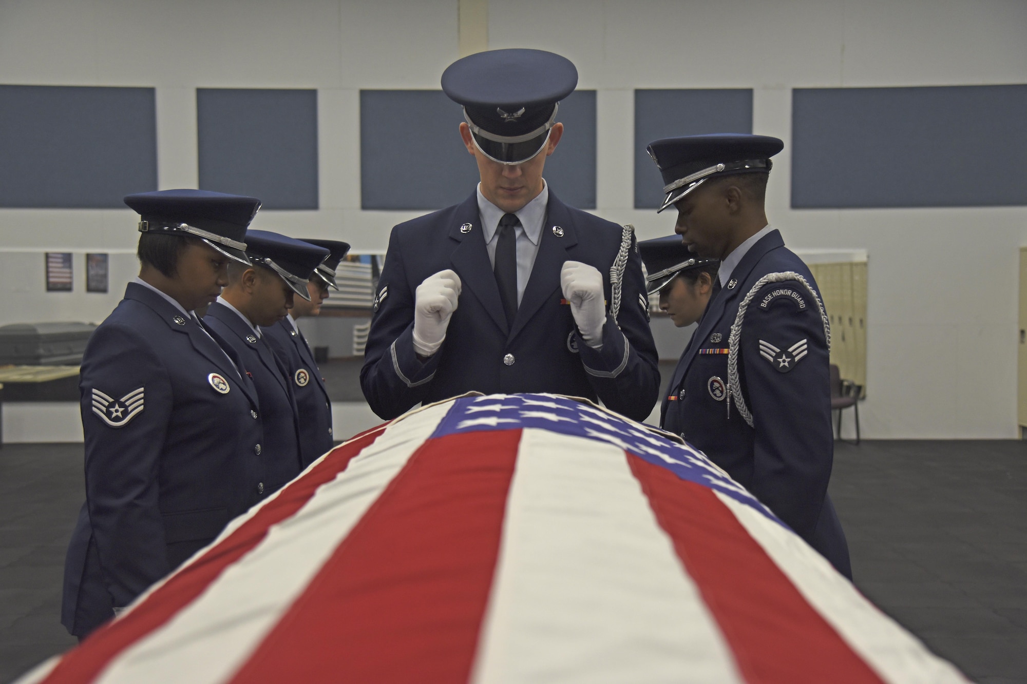 The Fairchild Honor Guard conducts military funeral training Nov. 16, 2017, at Fairchild Air Force Base, Washington. Honor guard’s mission is unlike any other, spending upward of 60 hours a week together traveling, training and preparing for ceremonies. The Fairchild Honor Guard covers the entire Pacific Northwest community, displaying their precision and excellence in Washington, Montana, Idaho and Oregon. (U.S. Air Force photo/Senior Airman Mackenzie Richardson)