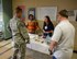 Decora Butler, 56th Medical Group environmental health technician, and Yyolany Caffrey, 56th Medical Group Health Promotions coordinator, answer questions and hand out educational materials about the Great American Smokeout at Luke Air Force Base, Ariz., Nov. 17, 2017. GASO takes place every year on the third Thursday of Novemeber and encourages smokers to quit, or begin to make a plan to quit, using tobacco products. (U.S. Air Force photo/Airman 1st Class Caleb Worpel)