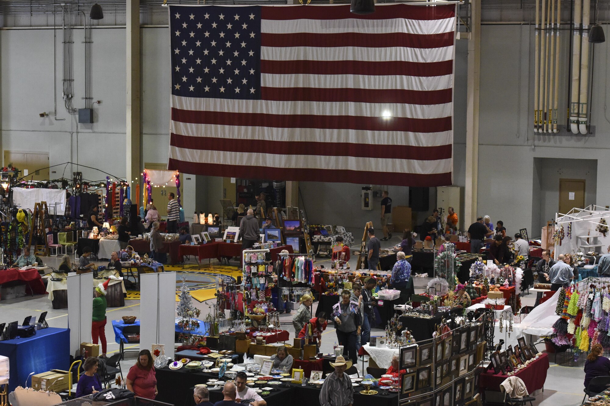 Goodfellow hosts the 37th Santa’s Market and Community Appreciation Day, allowing local vendors to set up shops and sell their hand-made wares at the Louis F. Garland Department of Defense Fire Academy high bay on Goodfellow Air Force Base, Texas, Nov. 18, 2017. With more than 4,000 attendees, this was the largest community event on Goodfellow this year. (U.S Air Force photo by Airman 1st Class Zachary Chapman/Released)