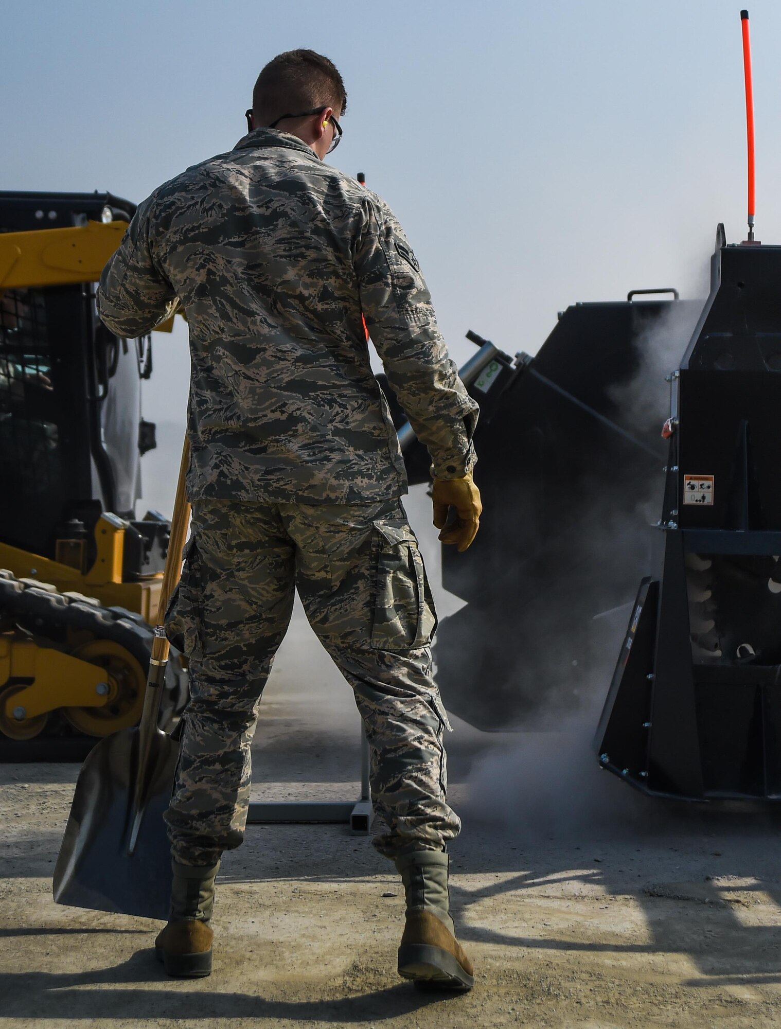 U.S. Air Force Airman 1st Class Alec Cates, 773d Civil Engineer Squadron, participates in a Rapid Airfield Damage Repair bilateral training exercise at Gwangju Air Base, Republic of Korea, Nov. 8, 2017. Approximately forty U.S. Airmen from the 773d CES at Joint Base Elmendorf-Richardson, Alaska, and 40 R.O.K. Airmen worked shoulder-to-shoulder to learn the new RADR process, enhance interoperability, prepare for wartime contingencies and strengthen partnerships in the Indo-Asia Pacific region. (U.S. Air Force photo by Senior Airman Curt Beach)
