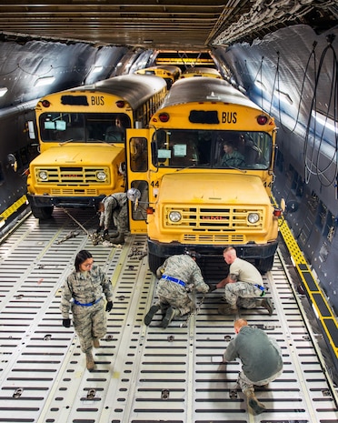 Mobility aircraft deliver buses to Haiti