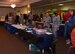 90th Medical Group Airmen wait for patrons to come to the Warren Top 3 craft fair and health fair, to share their information on F.E. Warren Air Force Base Wyo., Nov. 17, 2017. The purpose of the Fair is to promote health, wellness and safety to not only the base but community beneficiaries. Squadrons from all across the wing and people from the community set up booths to help promote health, safety or sell their crafts. (U.S. Air Force photo by Airman 1st Braydon Williams)