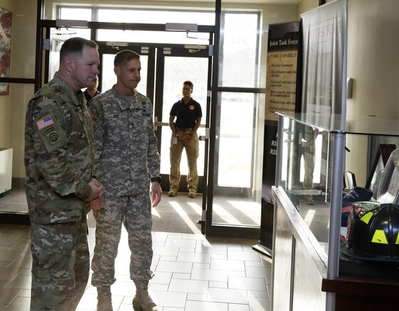 FORT EUSTIS, Va. – Army Lt. Gen. Perry Wiggins, commander, U.S. Army North, speaks with Maj. Gen. William F. Roy, commander, Joint Task Force Civil Support Feb. 3, 2016. JTF-CS anticipates, plans and prepares for chemical, biological, radiological and nuclear response operations. (Official DOD photo by Navy Petty Officer 2nd Class Benjamin T. Liston)