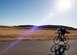 U.S. Air Force Capt. John Lachiewicz, an evaluation pilot with the 54th Air Refueling Squadron, rides his bike on Perimeter Road, Nov. 15, 2017, at Altus Air Force Base, Oklahoma.