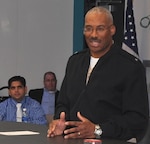 IMAGE: DAHLGREN, Va. - Rear Adm. Jesse Wilson, Naval Surface Force Atlantic commander, emphasizes the importance of innovating to the strategic environment as he spoke to a group of civilian technologists and military officers at the first in a series of Surface Warfare Innovation Workshops held at the Navy's newest Innovation Lab. Naval Surface Warfare Center Dahlgren Division (NSWCDD) and the Navy War College co-sponsored the event that encouraged NSWCDD scientists and engineers to throw away the rule book as they brainstormed to solve future warfighting scenarios. "The workshop enabled Navy leadership to share current and future Fleet concerns with our new and mid-career personnel to develop united, focused, and creative solutions," said NSWCDD I-Lab Director of Innovation Nelson Mills.