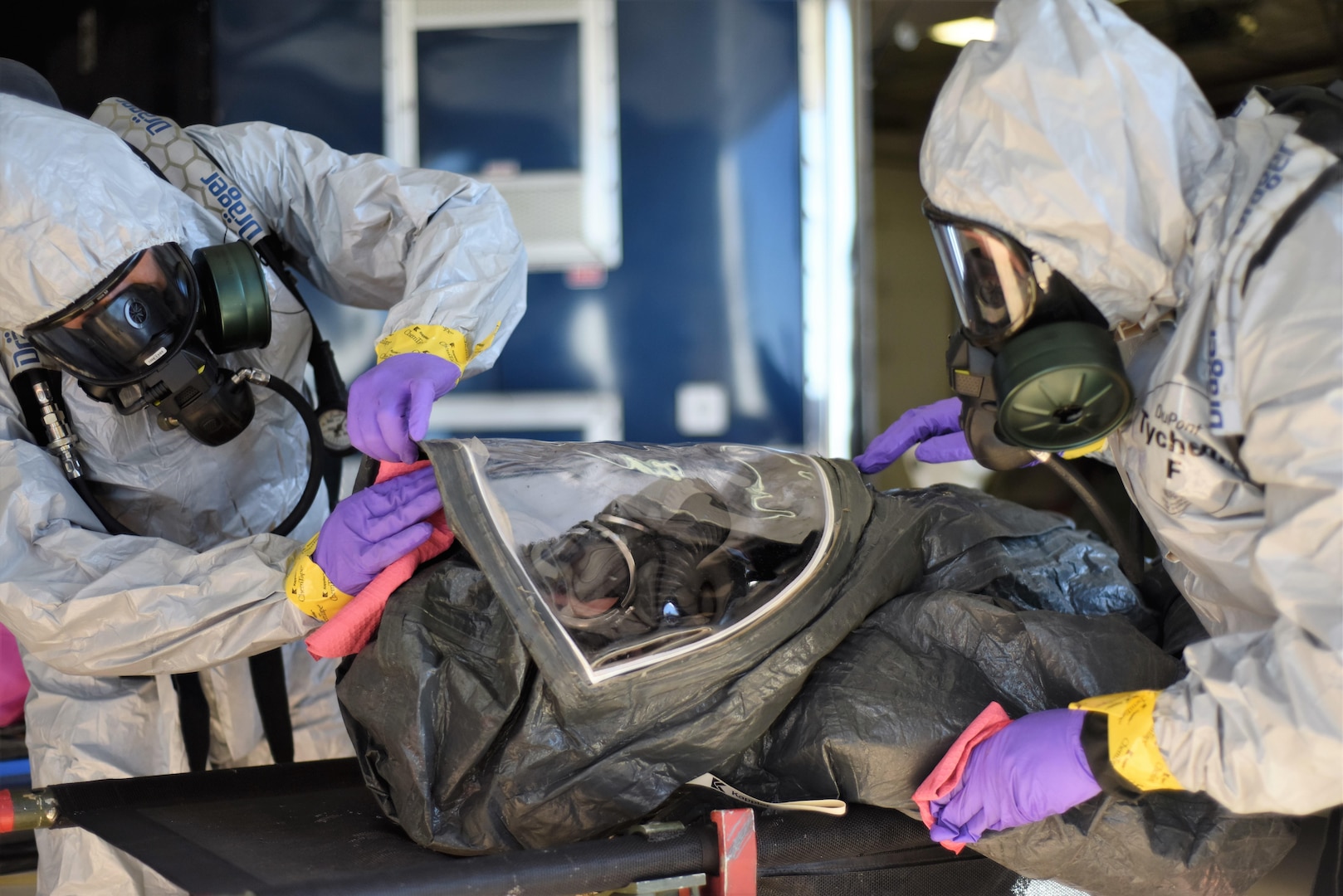 Decontamination team members of the Idaho National Guard’s 101st Civil Support Team practiced a new personnel decontamination procedure called the wipe-spray-wipe method during a hazardous incident exercise on Gowen Field, Oct. 26.