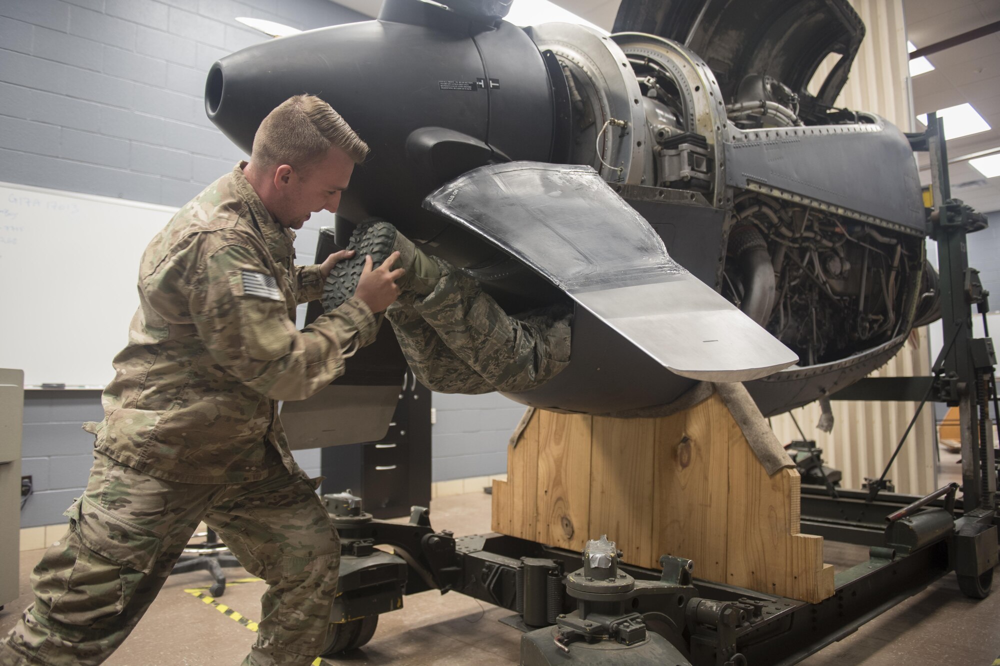 International service members learn with Cannon maintainers