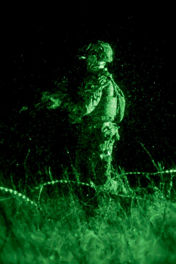 A U.S. Marines with Fox Company, Battalion Landing Team, 2nd Battalion, 6th Marine Regiment, 26th Marine Expeditionary Unit (MEU), runs to position during an assault part of a night mechanized raid, as part of Combined Composite Training Unit Exercise (COMPTUEX), Nov. 18, 2017. Combined COMPTUEX serves as the capstone event for the Amphibious Ready Group (ARG)/MEU team prior to deployment, fully integrating the ARG/MEU team as an amphibious force and testing their ability to execute missions across a range of military operations.