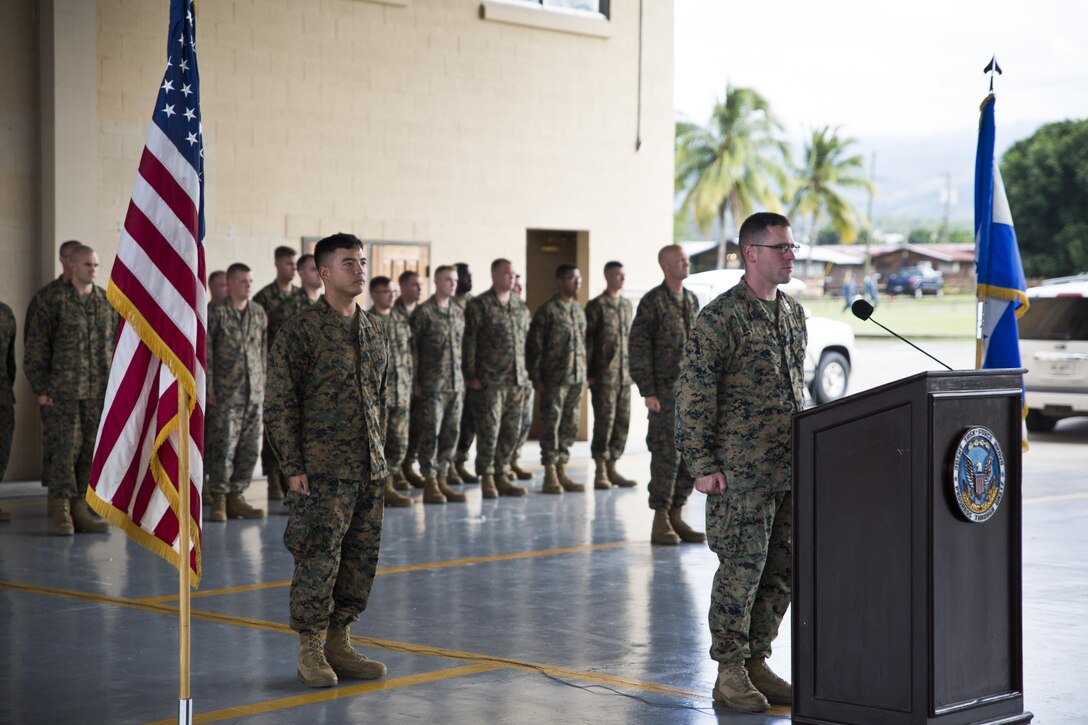 Marines with Special Purpose Marine Air-Ground Task Force - Southern Command stand at attention for the U.S. and Honduran national anthems during a closing ceremony at Soto Cano Air Base, Honduras, Nov. 8, 2017. The unit held a closing ceremony to wrap up their six-month deployment to Central America and to thank interagency and international partners for their support. The Marines and sailors of SPMAGTF-SC have completed a successful deployment in Central America and are scheduled to return to the United States in mid-November 2017.