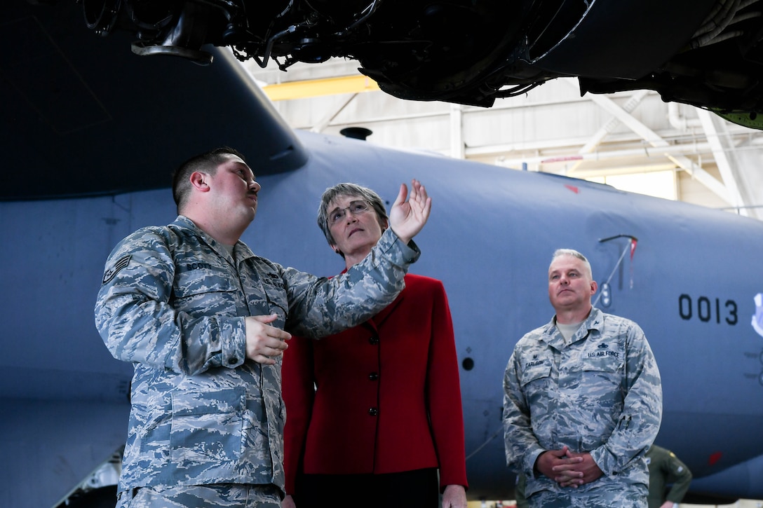 2nd Maintenance Squadron Airmen demonstrates a B-52H Stratofortress engine to, Secretary of the Air Force Heather Wilson during her tour of Barksdale Air Force Base, La., Nov. 14, 2017. As part of the tour Wilson spoke about a budget that supports the continuation and modernization of the nuclear triad. With the B-52H Stratofortress being estimated to be in service until 2050, The bomber is expected to receive upgraded engines with over 30 percent fuel reduction and 95 percent reduction in maintenance needs  (U.S. Air Force photo by Senior Airman Mozer O. Da Cunha)