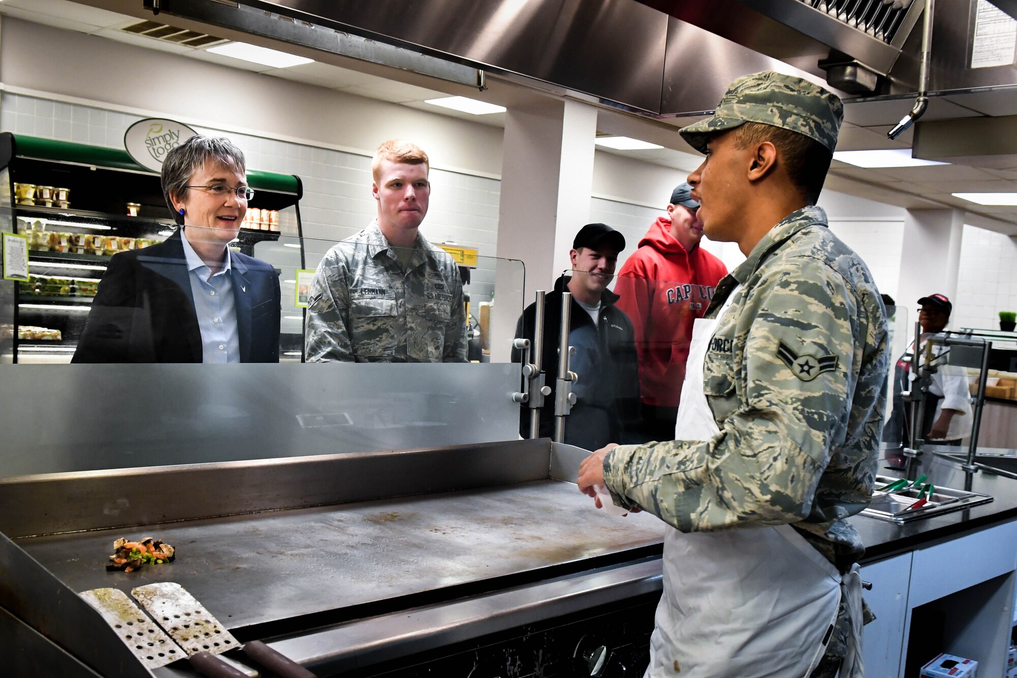 Secretary of the Air Force Heather Wilson speaks to a 2nd Force Support Airmen before meeting with junior Airmen during her tour at Barksdale Air Force Base, La., Nov. 14, 2017. Wilson Spoke with Airmen about the importance of readiness, modernization and innovation to remain the greatest Air Force in the world. (U.S. Air Force photo by Senior Airman Mozer O. Da Cunha)