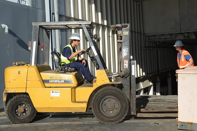 Iker Urruchi, Military Sealift Command’s USNS Brittin boatswain’s mate, operates a forklift on the vessel at Port of Ponce, Puerto Rico, Nov. 3, 2017.