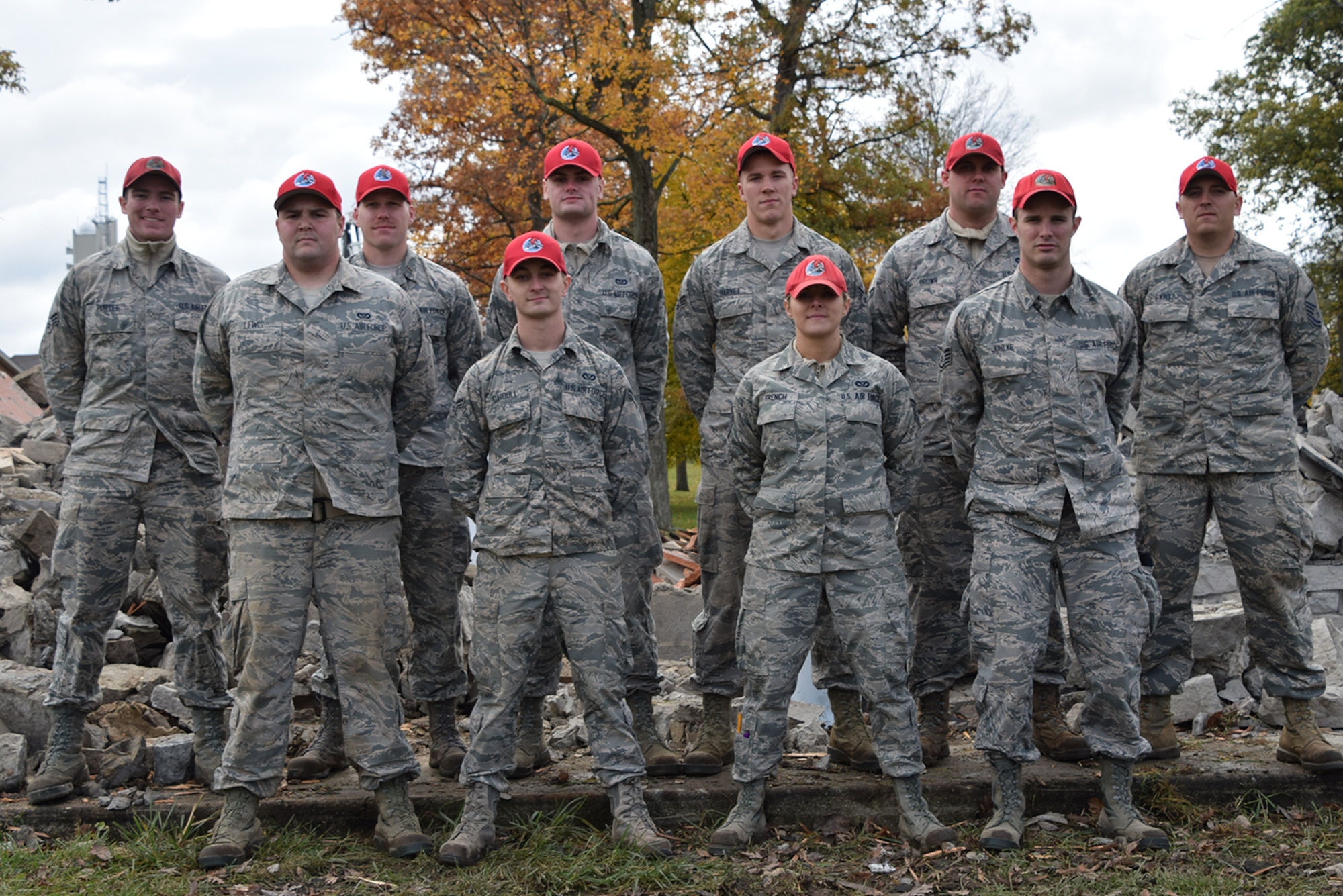 WRIGHT-PATTERSON AIR FORCE BASE, Ohio – 200th RED HORSE Detachment 1 members (back row, l to r) Senior Airman Zachary Purtee, 2nd Lt. Brett Baver, Airman 1st Class Kyle Panico, Senior Airman Jarrod Harvey, Airman 1st Class Matthew Brown, Master Sgt. Zachary Gwirtz, (front row, l to r) Senior Airman Joey Lewis, Airman 1st Class Chase Gardull, Tech. Sgt. Brittany French, Staff Sgt. Adam Juhlke. (U.S. Air Force photo/Katie Scott)