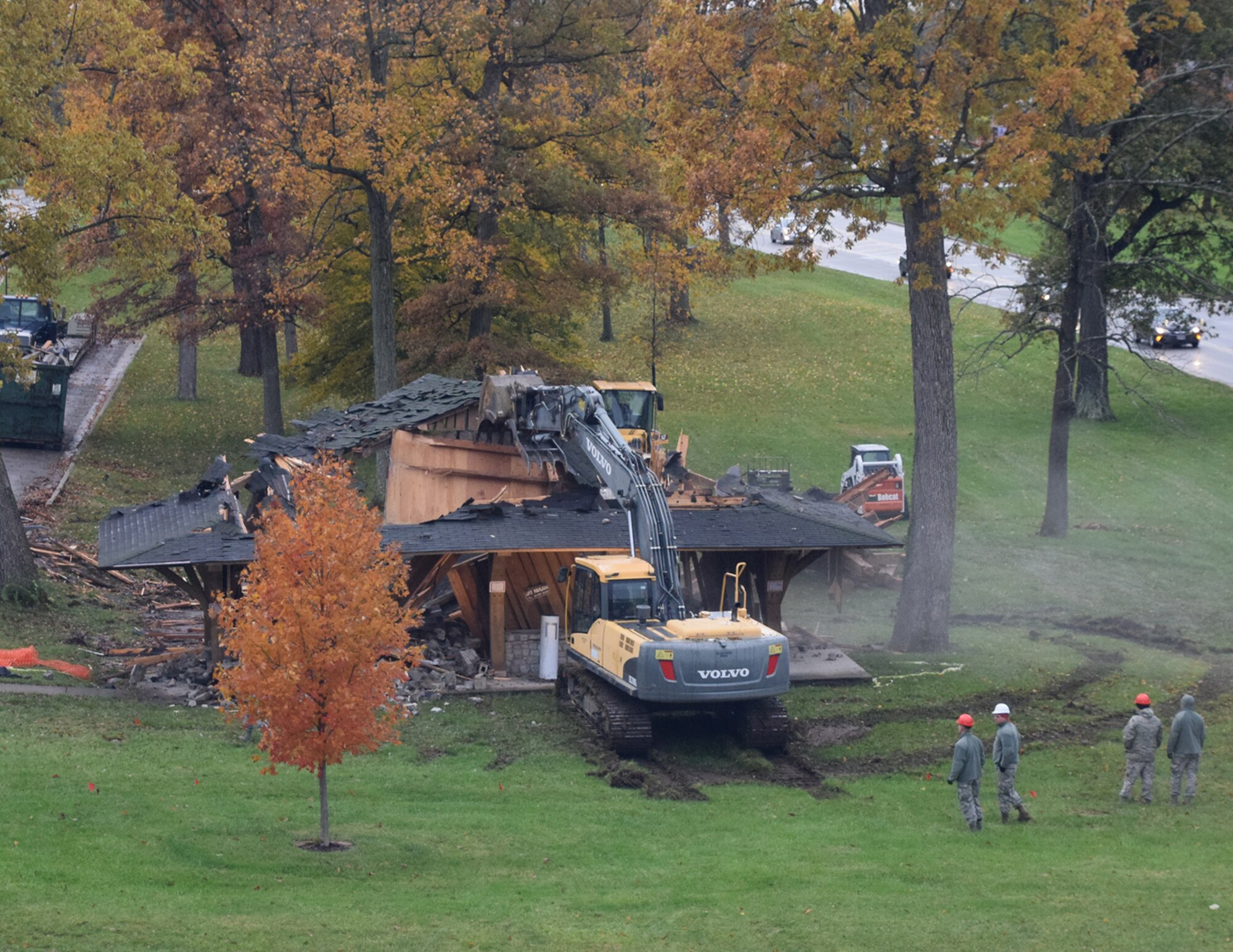 WRIGHT-PATTERSON AIR FORCE BASE, Ohio – 200th RED HORSE Detachment 1 Airmen begin the demolition of a condemned pavilion at the Air Force Institute of Technology Nov. 17, 2017. 200 RHS is using the demolition and subsequent construction of a new pavilion as a cooperative training exercise along with AFIT students and faculty. (U.S. Air Force photo/Katie Scott)