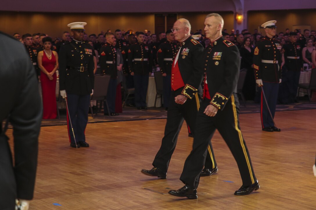 The official party of the Marine Barracks Birthday Ball march to center stage during the celebration of the Marine Corps’ 242nd birthday at the Washington Hilton, Washington D.C., Nov. 18, 2017. Each year, the Barracks holds a ball to honor and celebrate the Marine Corps’ birthday by reflecting on its rich traditions through the reading of Gen. John A. Lejeune’s Birthday Message and the cutting of the traditional birthday cake. (Official Marine Corps photo by Cpl. Damon Mclean/Released)