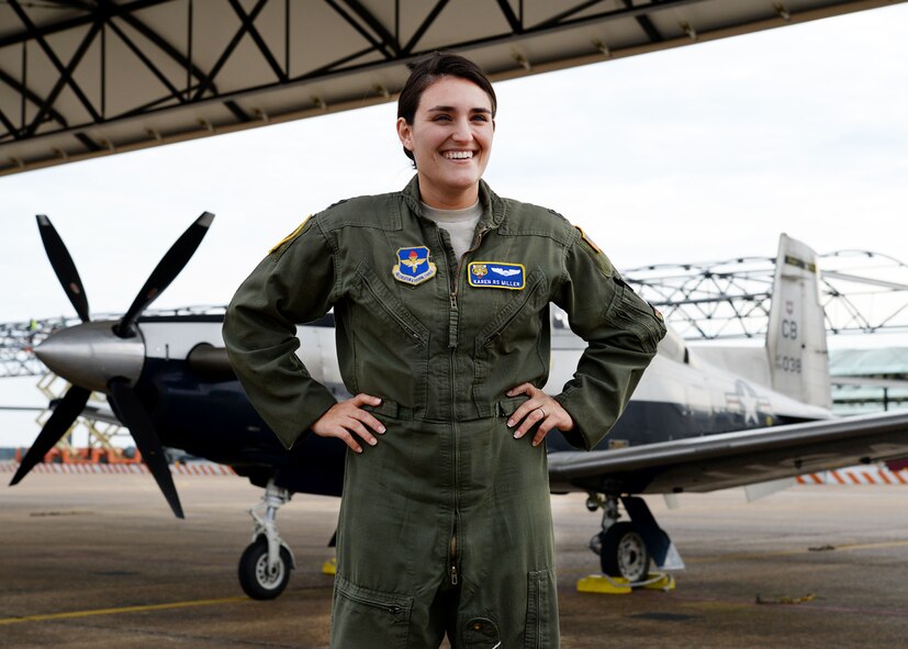 Capt. Karen Miller, 37th Flying Training Squadron instructor pilot, stands in front of a T-6A Texan II Nov. 15, 2017, at Columbus Air Force Base, Mississippi. Miller was one of eight Airmen selected for the Inter-American Squadron Officer School at Joint Base San Antonio-Lackland, Texas. (U.S. Air Force photo by Airman 1st Class Beaux Hebert)