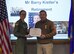 Col. Stacy Huser, 90th Missile Wing commander, presents the outstanding civilian career service award to Berry Kistler, 90th Inspector General, November 8, 2017, on F.E. Warren Air Force Base Wyo. Kistler plans to move to Arizona and enjoy life and relax with his family. (U.S. Air Force photo by Airman 1st Class Braydon Williams)