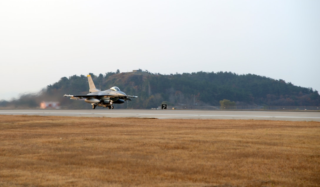 A U.S. Air Force F-16 Fighting Falcon taxis on the runway at Kunsan Air Base, Republic of Korea, Nov. 17, 2017 during a large force employment. The 8th FW regularly tests its ability to conduct LFEs in exercises and regular training, giving pilots, maintainers and support personnel the scenarios they need to validate their ability to launch large numbers of aircraft in a short amount of time. (U.S. Air Force photo by Senior Airman Colby L. Hardin)