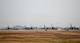 U.S. Air Force F-16 Fighting Falcons from the 80th and 35th Fighter Squadrons under the 8th Fighter Wing await take-off clearance at the end of the runway at Kunsan Air Base, Republic of Korea, Nov. 17, 2017. The 8th FW conducted what’s known as a large force employment to test the wing’s ability to generate numerous aircraft in support of combat training sorties. (U.S. Air Force photo by Capt. Christopher Mesnard)