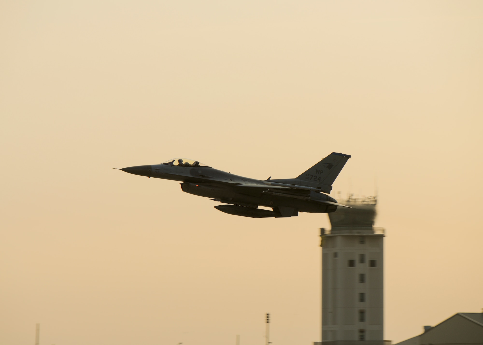 A U.S. Air Force F-16 Fighting Falcon with the 35th Fighter Squadron takes off from Kunsan Air Base, Republic of Korea, Nov. 17, 2017 during a large force employment drill in which the 8th Fighter Wing launched more than 20 aircraft to test its ability to conduct combat operations with large numbers jets in the air. The 8th FW regularly tests its ability to conduct LFEs in exercises and regular training, which gives pilots, maintainers and support personnel the scenarios they need to validate their ability to launch large numbers of aircraft in a short amount of time. (U.S. Air Force by Capt. Chris Mesnard)