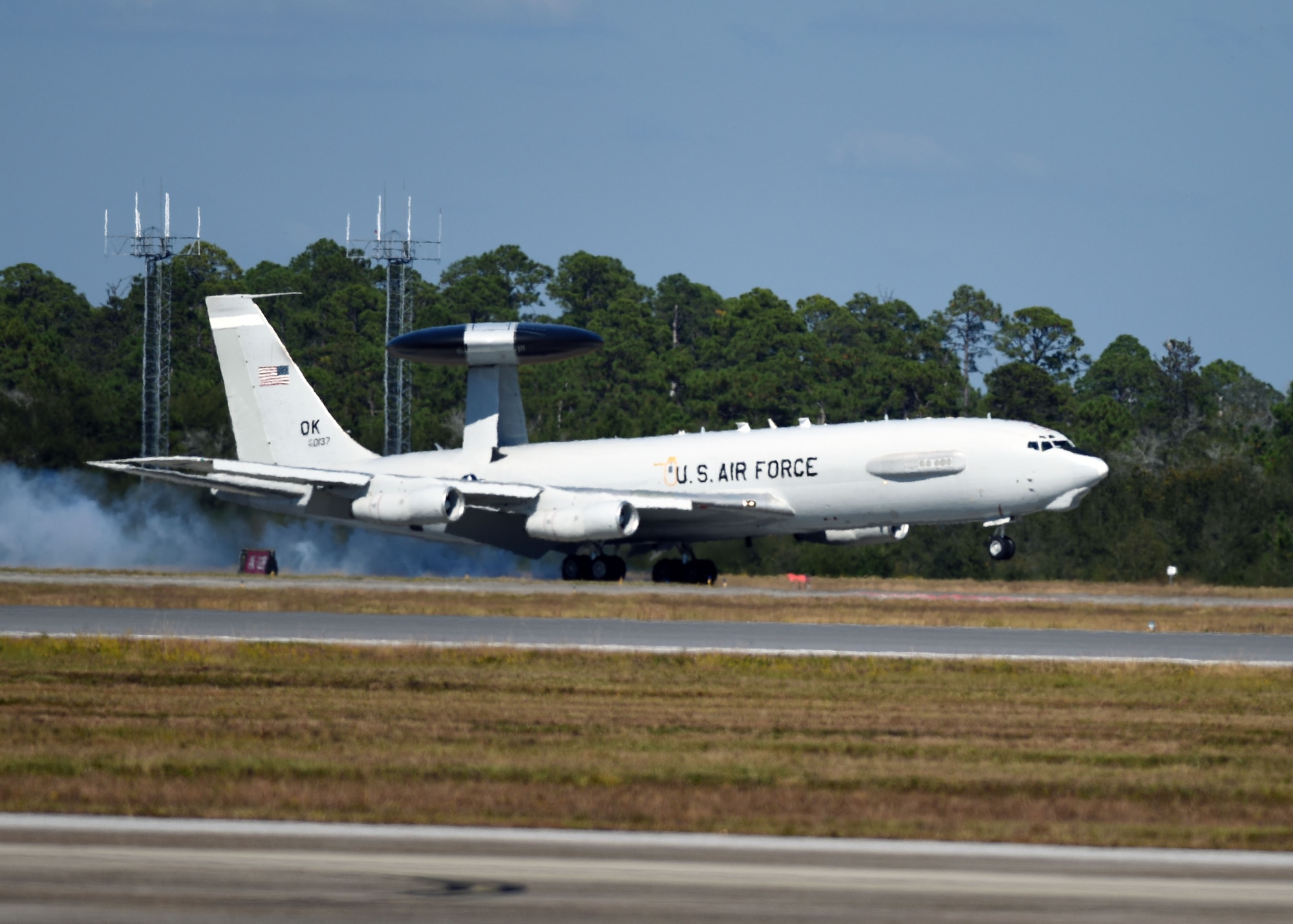 A U.S. Air Force E-3 Sentry Airborne Warning and Control System from the 552nd Air Control Wing, Tinker Air Force Base, Okla., touches down on the flightline at Tyndall Air Force Base, Fla., Nov. 7, 2017. The AWACS was at Tyndall participating in Checkered Flag 18-1, a large-scale aerial exercise designed to integrate fourth and fifth-generation airframes while providing a platform for maintenance teams to be evaluated.