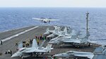 A C-2A Greyhound assigned to Fleet Logistics Support Squadron (VRC) 30 launches from the flight deck of the Navy's forward-deployed aircraft carrier and flagship of Carrier Strike Group five, the aircraft carrier USS Ronald Reagan (CVN 76). Ronald Regan is participating in Annual Exercise 2017, the premier training event between the U.S. Navy and the Japan Maritime Self-Defense Force, is designed to increase the defensive readiness and interoperability of Japanese and American Forces through training in air and sea operations.