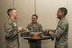 U.S. Air Force Airman 1st Class David Collins, 20th Operations Support Squadron airfield management operations coordinator, left, Airman 1st Class Nathan Parker, middle, and Airman Angel Hernandez, 20th Aircraft Maintenance Squadron tactical aircraft maintainers, chat during a Welcome Weasel Commander Breakfast at the Carolina Skies Club and Conference Center at Shaw Air Force Base, South Carolina, Nov. 20, 2017.