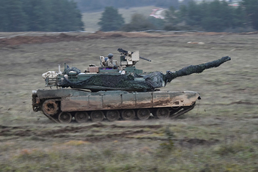 U.S. soldiers maneuver an M1A2 Abrams tank during Exercise Allied Spirit VII at the 7th Army Training Command’s Hohenfels Training Area, Germany.