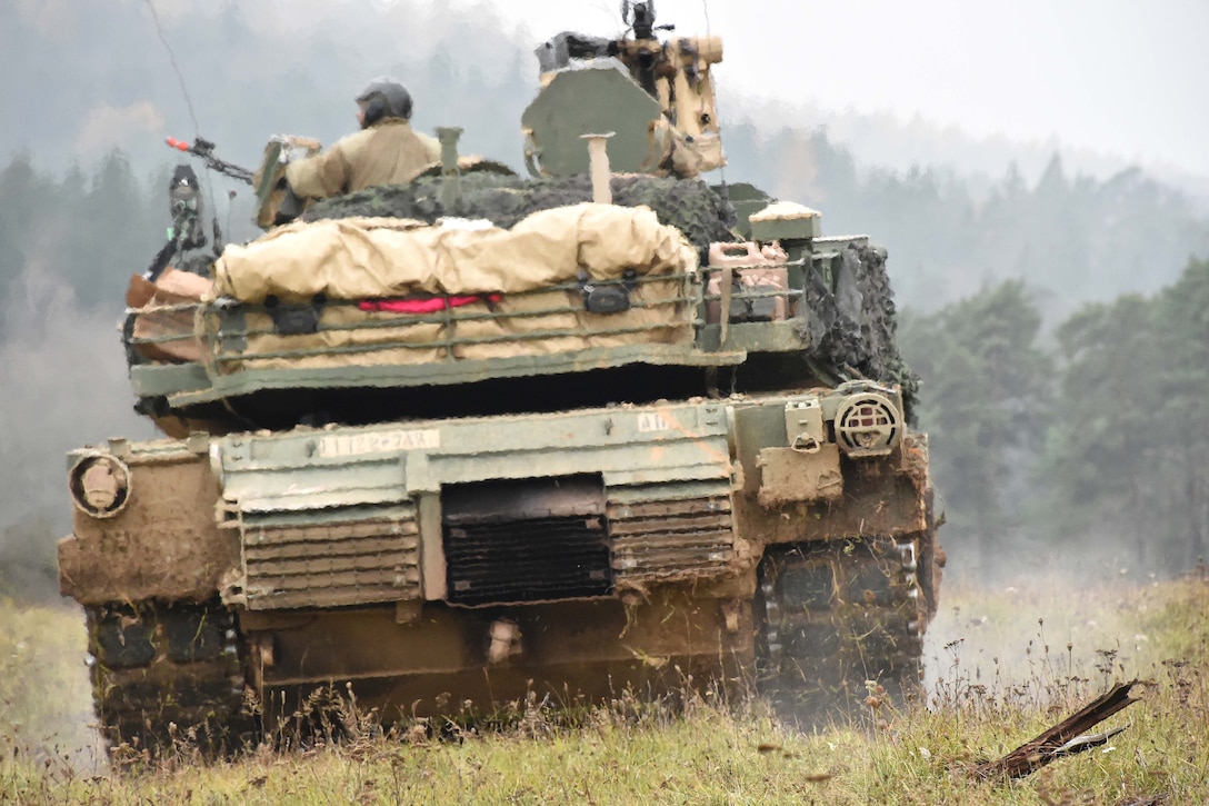 U.S. soldiers maneuver an M1A2 Abrams tank during Exercise Allied Spirit VII on the 7th Army Training Command’s Hohenfels Training Area, Germany.