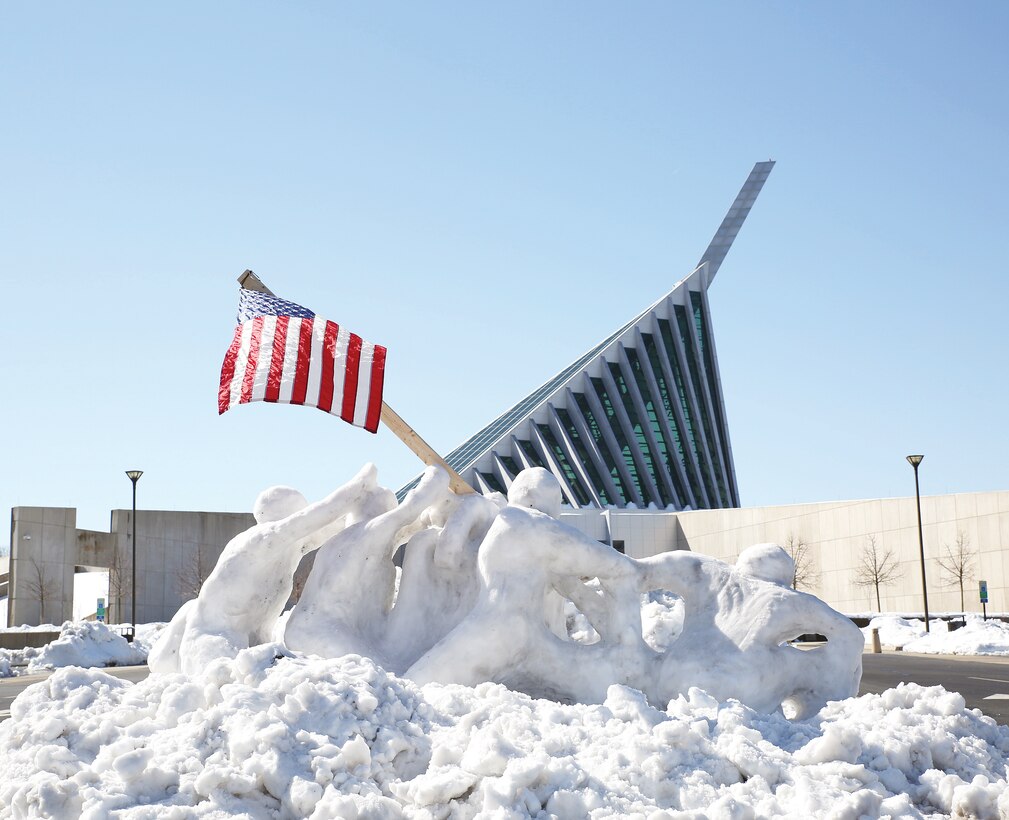When it snows people's creativity comes out.  Here is a snow sculpture of Iwo Jima created at the National Museum of the Marine Corps by a Marine.