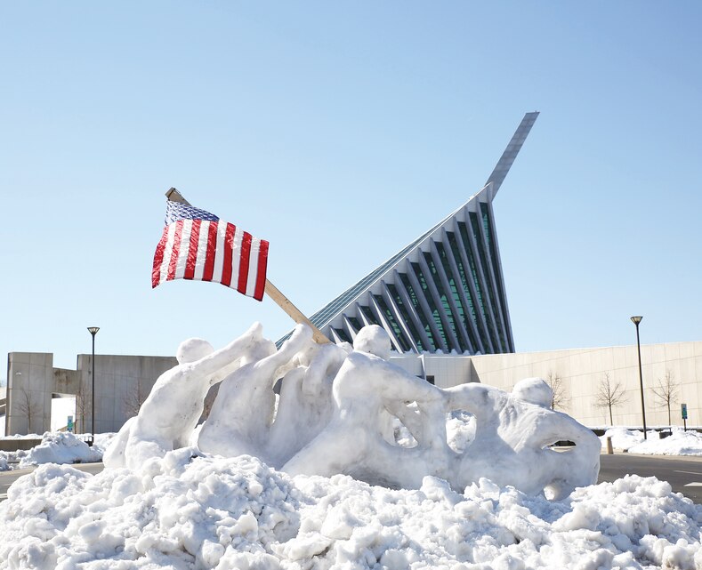 When it snows people's creativity comes out.  Here is a snow sculpture of Iwo Jima created at the National Museum of the Marine Corps by a Marine.