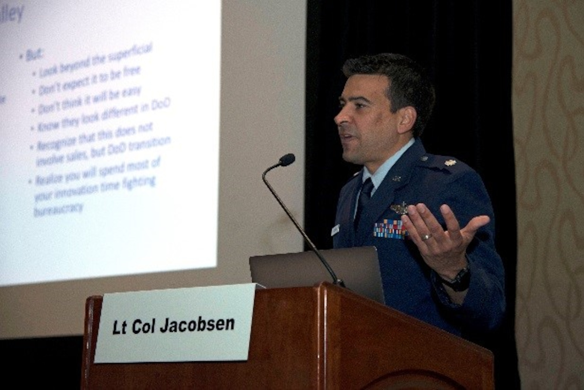 U.S. Air Force Lt. Col. Mark Jacobsen, founder of Uplift Aeronautics, gives a presentation during a seminar at the Airlift Tanker Association Symposium at the Marriott World Center in Orlando, Fla., Oct. 27, 2017. Jacobsen’s seminar focused on what the Department of Defense can take away from Silicon Valley and how to apply it throughout the Air Force. (U.S. Air Force Photo by Airman 1st Class Ashley Perdue)