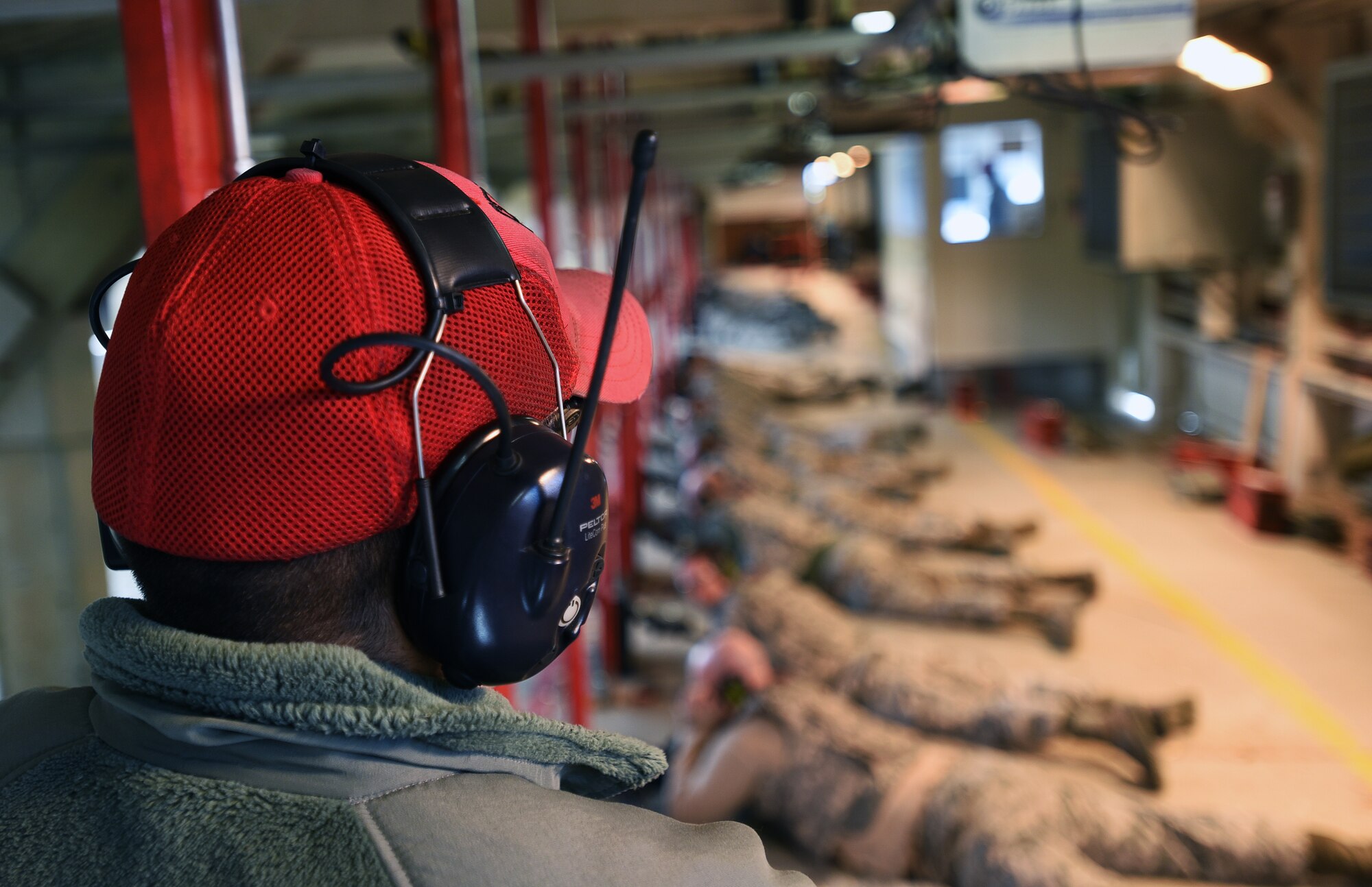 Staff Sgt. Collins Mensing, 22nd Security Forces Squadron combat arms instructor, oversees an M4 Carbine firing class Nov. 20, 2017, at McConnell Air Force Base, Kansas.
Combat arms instructors ensure Airmen are familiarized and fully qualified with their weapons. (U.S. Air Force photo by Airman Michaela R. Slanchik)