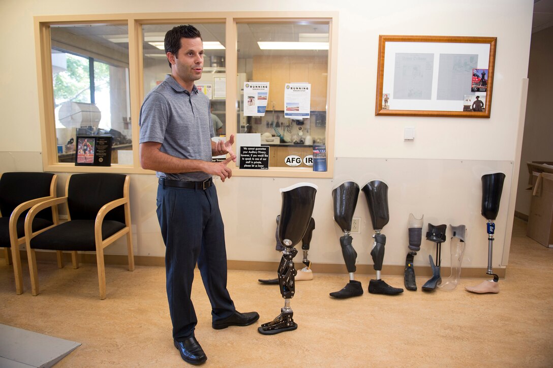Brian Zalewski, head of prosthetics at Naval Medical Center San Diego, discusses the custom prosthetics built at the hospital, Sept. 15, 2017. DoD photo by EJ Hersom