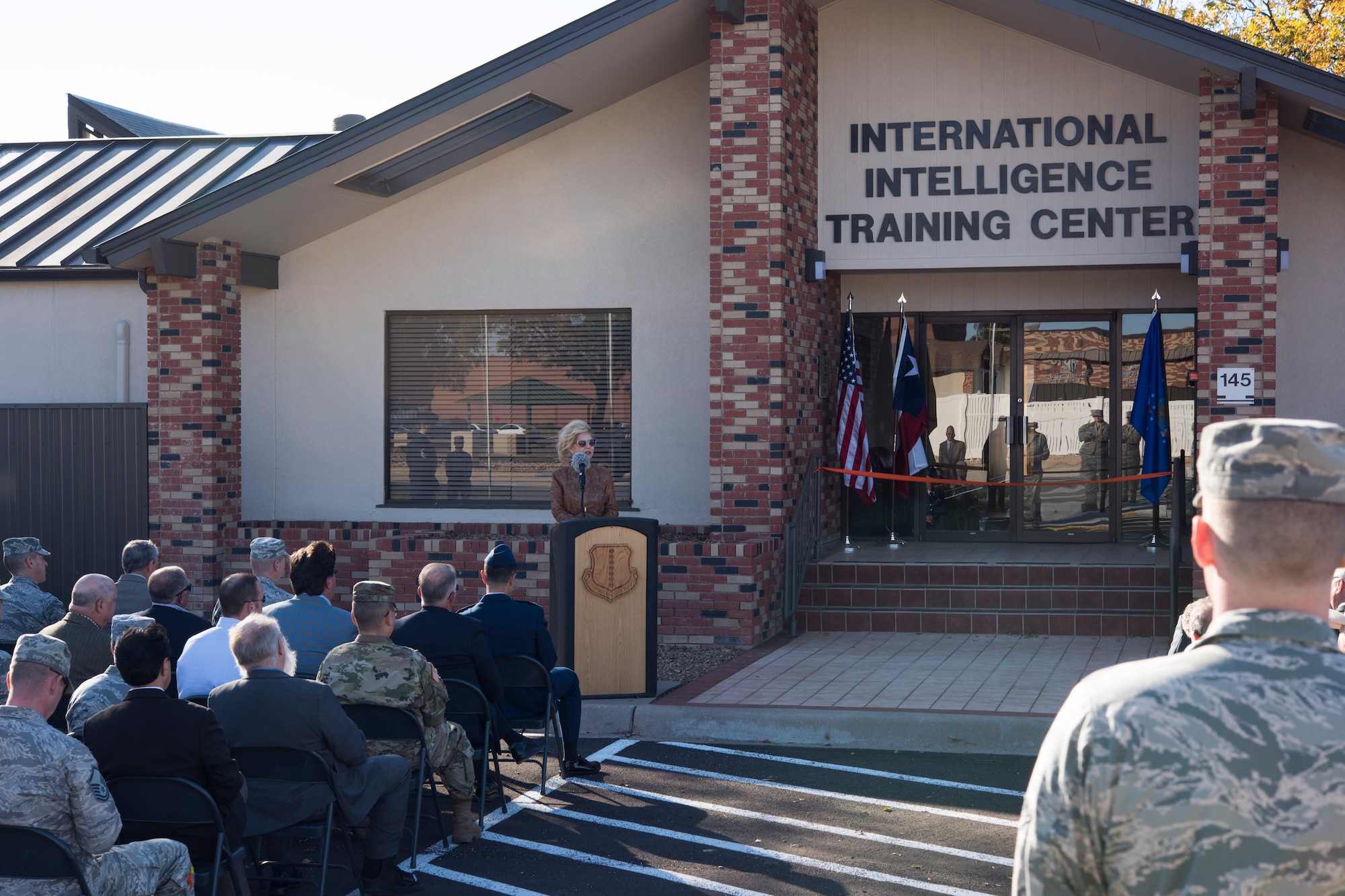 Brenda Gunter, San Angelo mayor, gives a speech before the ribbon cutting for the International Intelligence Training Center on Goodfellow Air Force Base, Texas, Nov. 21, 2017. Gunter was just one of the civic leaders who attended the ribbon cutting which signified the opening. (U.S. Air Force photo by Airman 1st Class Zachary Chapman/Released)