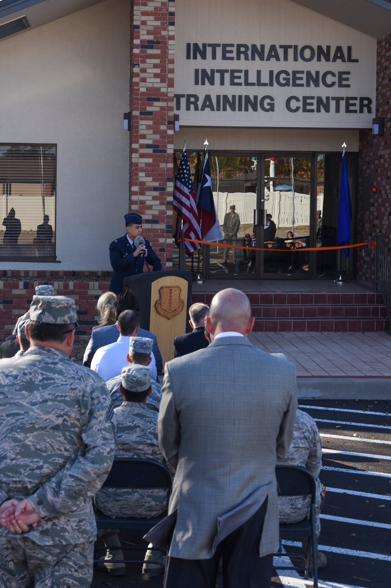 U.S. Air Force Col. Ricky Mills, 17th Training Wing commander, shares a few words before the ribbon cutting for the International Intelligence Training Center on Goodfellow Air Force Base, Texas, Nov. 21, 2017. Mills spoke on the importance of international partnerships for Goodfellow and the United States. (U.S. Air Force photo by Airman 1st Class Zachary Chapman/Released)
