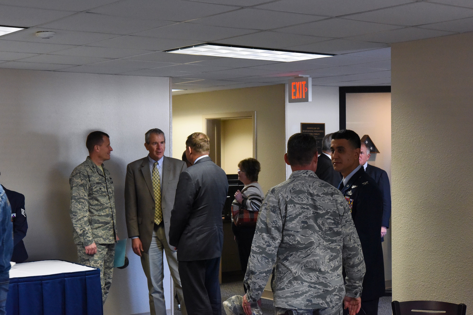 Guests socialize after the ribbon cutting of the International Intelligence Training Center on Goodfellow Air Force Base, Texas, Nov. 21, 2017. Base leadership and San Angelo civic leaders had the chance to examine the training center after the ceremony. (U.S. Air Force photo by Airman 1st Class Zachary Chapman/Released)