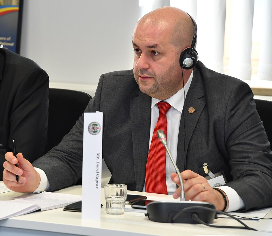 Dorel Caprar, chairman of the Defense, Public Order and National Security Committee of the Chamber of Deputies of Romania, asks a question, Nov. 16, 2017, during a tailored seminar on security policy for 13 Romanian parliamentarians held Nov. 16-17 at the George C. Marshall European Center for Security Studies in Garmisch-Partenkirchen, Germany. DoD photo by Karl-Heinz Wedhorn