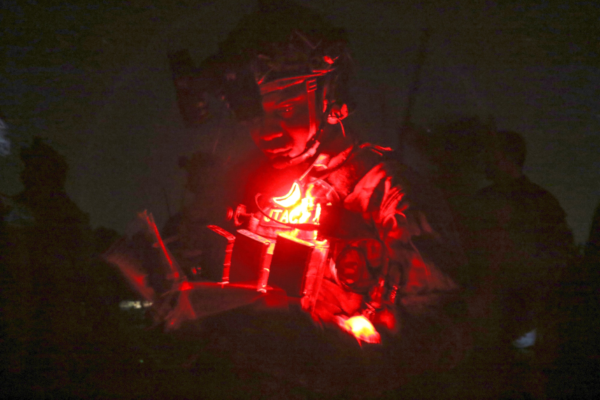 Pennsylvania Air National Guard Staff Sgt. Equeno Ogle, with 148th Air Support Operations Squadron, sends coordinates to an AC-130U gunship during a live fire training mission as part of exercise Southern Strike 18 Oct. 24, 2017, at Camp Shelby Joint Forces Training Center near Hattiesburg, Miss. The exercise provides operational level integration between the Army, Navy, Air Force and Marines using joint and combined doctrine, policies, and procedures to equip our service members with the experience of operating in a joint environment. (U.S. Army National Guard photo by Spc. Christopher Shannon)
