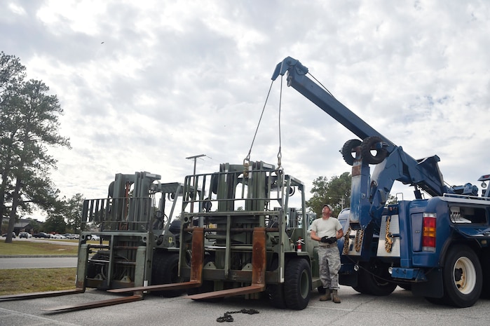 Staff Sgt. Jesse Turner, 628th Logistics Readiness Squadron operator, records and licensing NCO in Charge, prepares to move a forklift Nov. 14, 2017, at Joint Base Charleston, S.C. The 628th LRS transported approximately 38 pallets weighing roughly 130 short tons and issued about two million gallons of fuel for aircraft and ground vehicles in support of Hurricane Maria relief efforts to Puerto Rico.