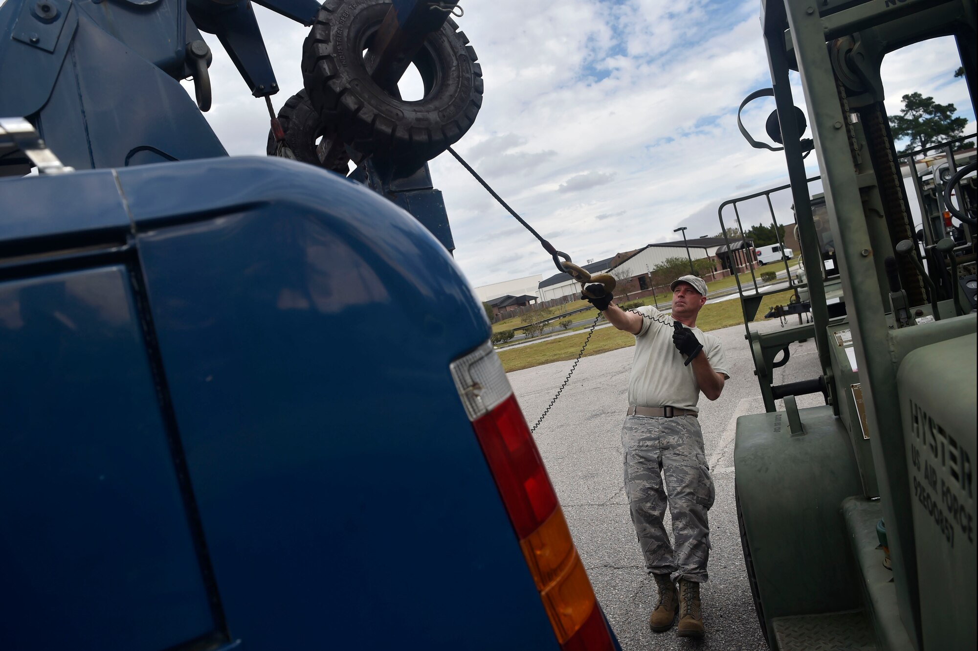 Staff Sgt. Jesse Turner, 628th Logistics Readiness Squadron operator, records and licensing NCO in Charge, prepares to move a forklift Nov. 14, 2017, at Joint Base Charleston, S.C. The 628th LRS transported approximately 38 pallets weighing roughly 130 short tons and issued about two million gallons of fuel for aircraft and ground vehicles in support of Hurricane Maria relief efforts to Puerto Rico.