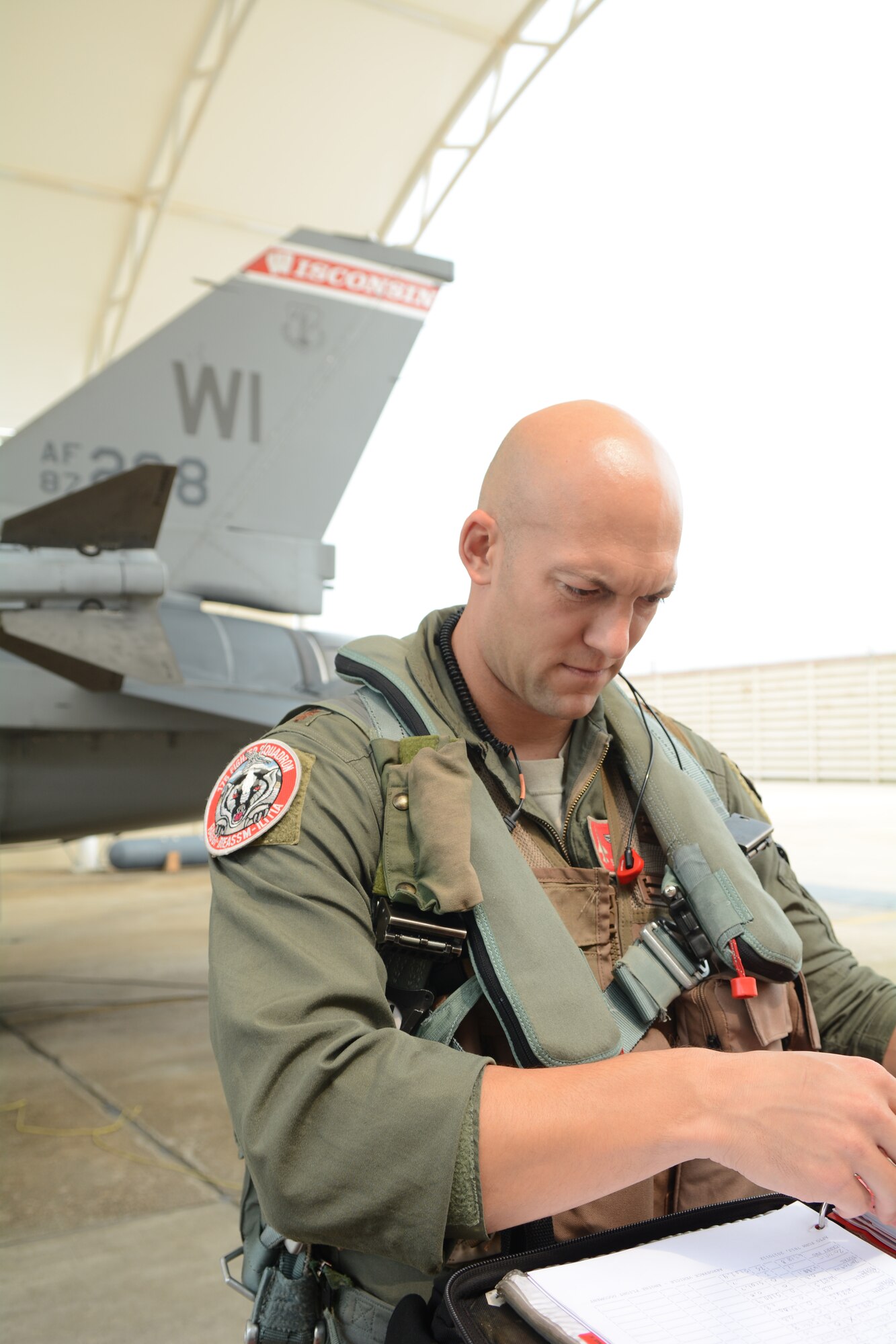 Maj. Ryan “Stalker” Gaffaney, a pilot with the 176th Expeditionary Fighter Squadron prepares for launch at Kunsan Air Base, Republic of Korea, Sept. 19, 2017. Airmen from the 115th Fighter Wing, Wisconsin Air National Guard, are deployed to Kunsan for a 3-month rotation as part of a Theater Security Package, which helps to maintain a deterrent against threats to regional security and stability. (U.S. Air National Guard photo by Tech. Sgt. Meghan Skrepenski)
