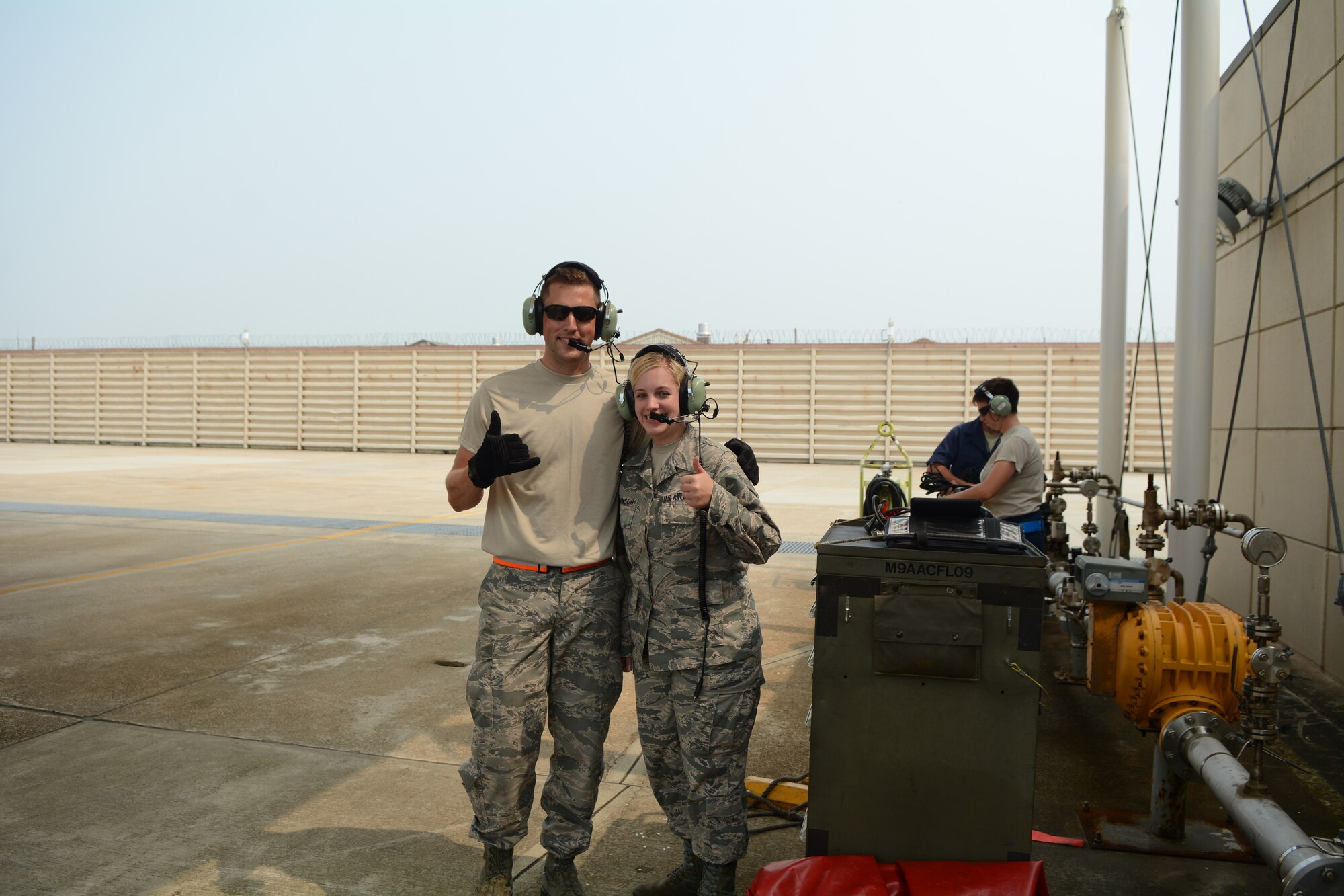 Staff Sgt. Chad Gaffney, a crew chief deployed with the 176th Expeditionary Aircraft Maintenance Unit and Senior Airman Molly Hermanson, an administrative journeyman for the 115th Fighter Wing, prepare an F-16 Fighting Falcon for launch at Kunsan Air Base, Republic of Korea, Sept. 19, 2017. Hermanson was able to assist through a Y-cord attached to her headset that allowed her to walk through the launch alongside Gaffney.  Airmen from the 115th Fighter Wing, Wisconsin Air National Guard, are deployed to Kunsan for a 3-month rotation as part of a Theater Security Package, which helps to maintain a deterrent against threats to regional security and stability. (U.S. Air National Guard photo by Tech. Sgt. Meghan Skrepenski)