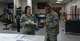 U.S. Air Force Capt. Bridgette Griffiths, the physical therapy element chief assigned to the 509th Medical Operations Squadron, discusses services available at the physical therapy clinic at Whiteman Air Force Base, Mo., Nov. 15, 2017.
