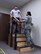 U.S. Air Force Staff Sgt. Brandon Berry, an electrical power production specialist assigned to the 509th Civil Engineer Squadron, is trained by Senior Airman Tiffani-Amber Petit, a physical therapy technician assigned to the 509th Medical Operations Squadron, on how to use crutches when traveling down a stair case to avoid further injury at Whiteman Air Force Base, Mo., Nov. 15, 2017.