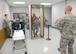 Senior Airman Sidney Laxdal, left, and Senior Airman Richard Loveless, right, 72nd Logistics Readiness Squadron, work the baggage check and security checkpoint area during a recent mobility exercise Oct. 4, 2017, Tinker Air Force Base, Oklahoma.