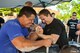 Two men arm wrestling