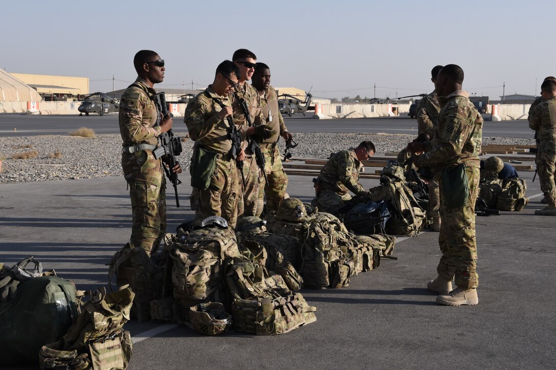 U.S. Army Soldiers with Task Force Marauder prepare to travel to Western Afghanistan as part of an Expeditionary Advisory Package providing aviation support to ground troops. TF Marauder provided medevac, air transportation, over-watch support, and forward arming and refueling point operations for the Train, Advise, Assist Command – West to assist with ground missions in the region. Task Force Marauder consists of Soldiers from South Carolina National Guard, Illinois National Guard, Iowa National Guard, as well as active duty component and provides aviation capabilities with AH64 Apaches, UH60 Black Hawks, CH47 Chinooks, and MEDEVAC assets in Afghanistan under the 3rd Combat Aviation Brigade while deployed.